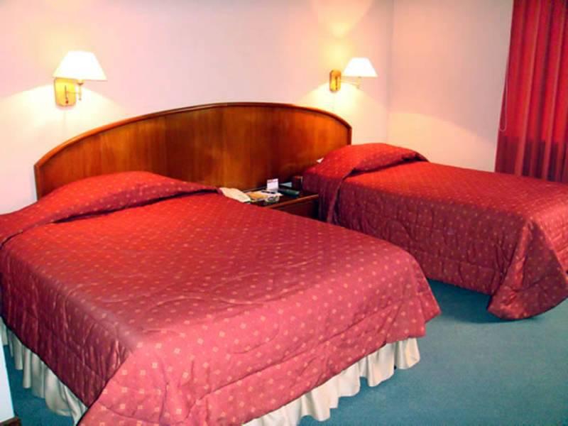 Hotel Park Suites Lima Quarto foto